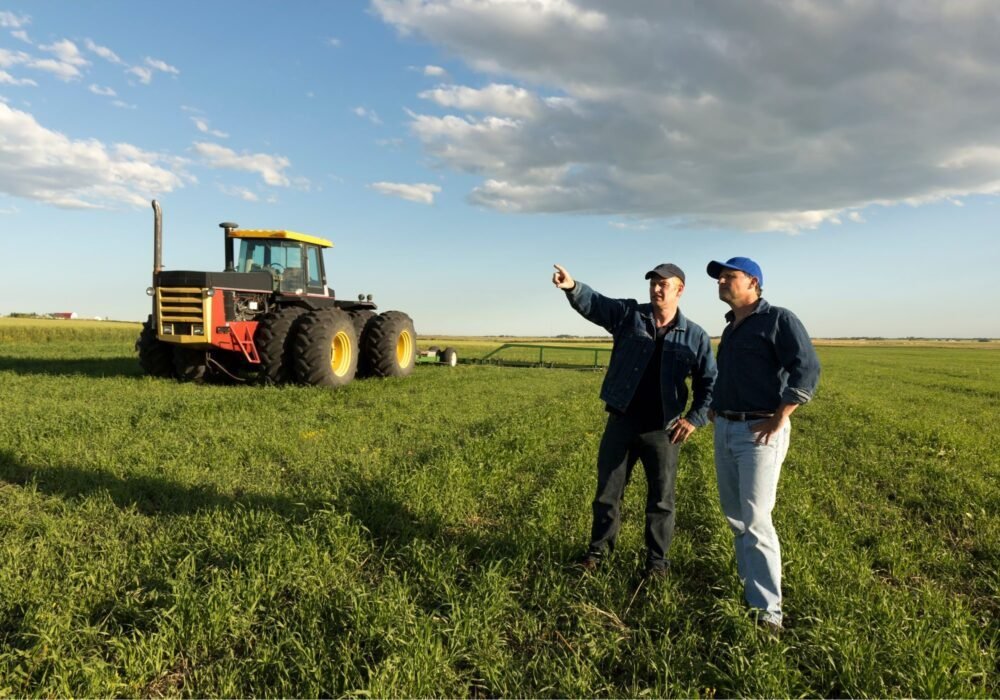 farmers in field with tractor - 1
